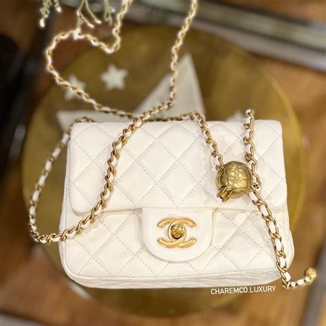 chanel gold ball mini flap bag|Chanel mini flap bag review.